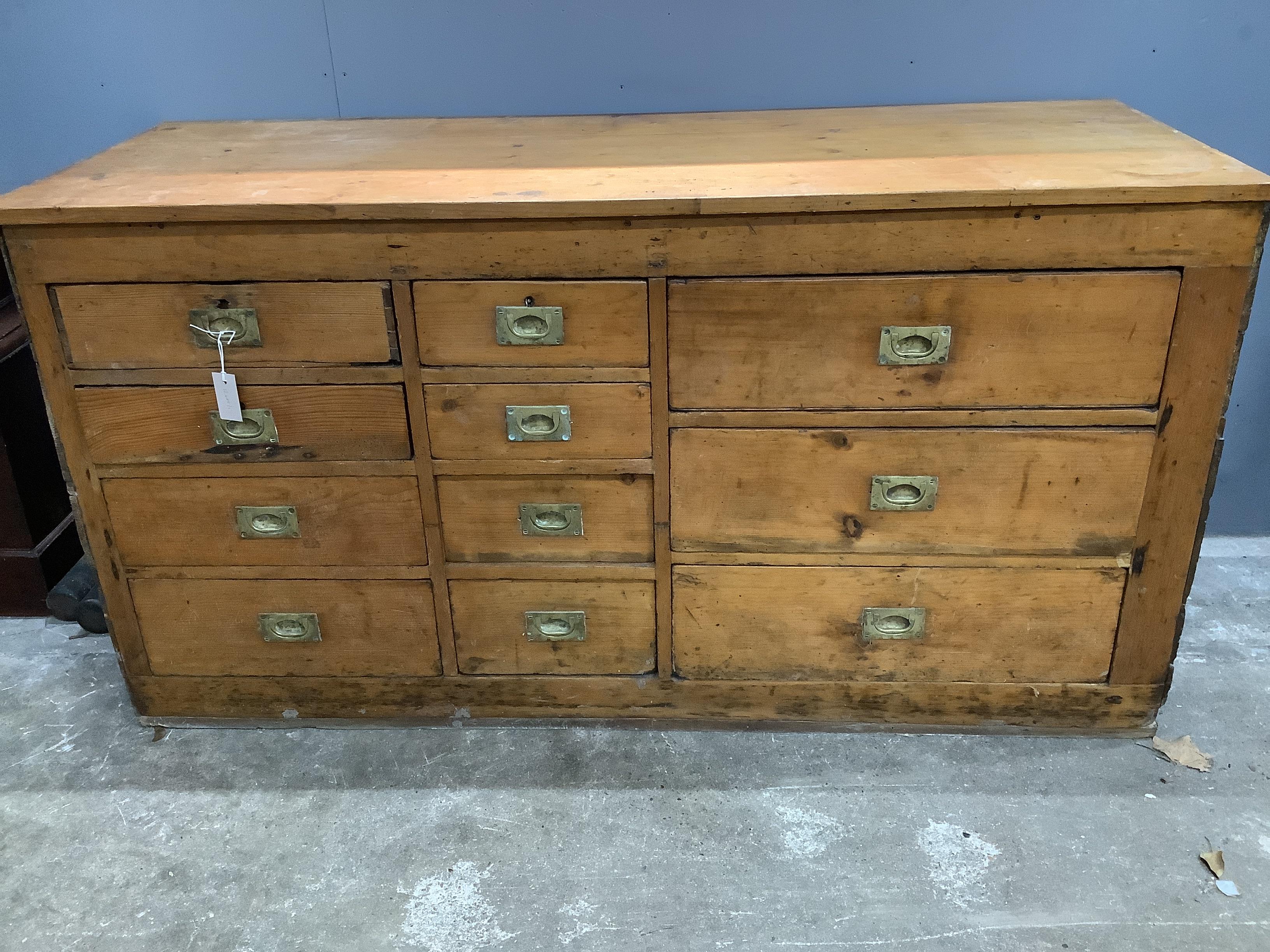 A pine counter ten drawers, width 164cm, depth 62cm, height 86cm